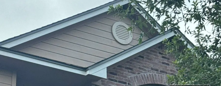 After: gable vent replacement. Open, rotted gable vent replaced and sealed.