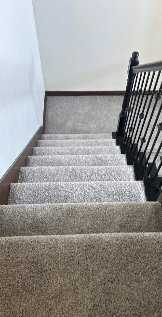 After: stair carpet replacement. Worn carpet out, new pad and carpet in.