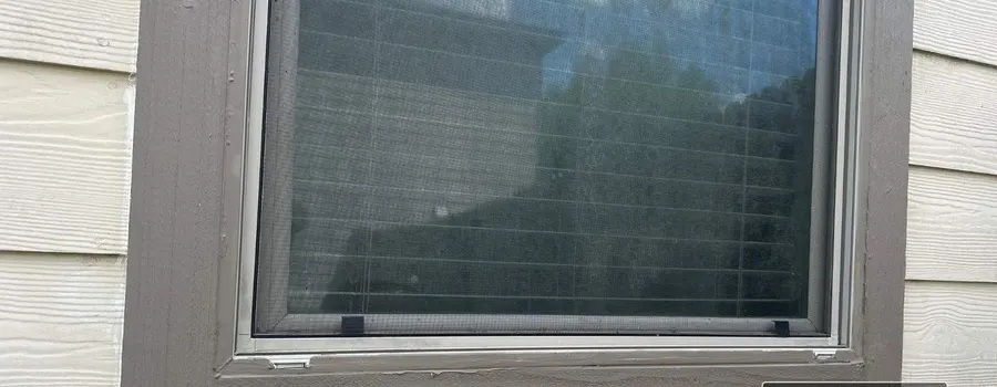 After: window trim rot repair. Rotted sill trim replaced, caulked and painted.